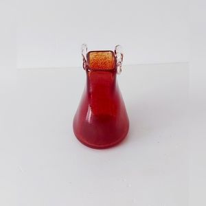 Small art glass in the shape of a handbag